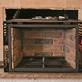 Chimney techs install a fireplace insert on Moores Mill Rd in Buckhead Ga