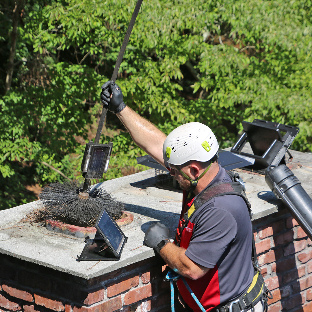 Chimney sweep doing an inspection in Atlanta, Georgia